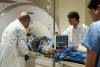 A focused ultrasound helmet is attached to an MRI scanner as part of an early-stage clinical trial exploring the delivery of immunoglobulin to the brain of a patient with ALS at Sunnybrook Health Sciences Centre in Toronto on Wednesday. (The Canadian Press)