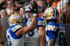 ETHAN CAIRNS / THE CANADIAN PRESS
                                Winnipeg Blue Bombers&rsquo; Dalton Schoen, centre, celebrates scoring a touchdown against the B.C. Lions with Nic Demski, left, and Keric Wheatfall, right, during the first half of a CFL football game in Vancouver, on Saturday, June 21, 2025.