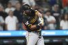 Pittsburgh Pirates' Isiah Kiner-Falefa hits a two-run single against the Detroit Tigers in the 10th inning during the second baseball game of a doubleheader, Thursday, June 19, 2025, in Detroit. (AP Photo/Paul Sancya)