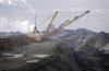 A dragline works in coal pits in front of the SaskPower Shand Power Station on Tuesday, March 19, 2008, south of Estevan, Sask. Saskatchewan's government says it's planning to extend the life of the province's coal plants before moving to nuclear power generation. THE CANADIAN PRESS/Troy Fleece