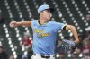 Milwaukee Brewers pitcher Jacob Misiorowski throws against St. Louis Cardinals' Lars Nootbaar as he makes his major league debut during the first inning of a baseball game Thursday, June 12, 2025, in Milwaukee. (AP Photo/Kayla Wolf)