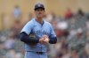 Toronto Blue Jays starting pitcher Bowden Francis (44) stands on the mound after issuing a walk to Minnesota Twins' Willi Castro (50) during the second inning of a baseball game Sunday, June 8, 2025, in Minneapolis. (AP Photo/Abbie Parr)