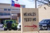 FILE - A sign is seen outside of Seminole Hospital District offering measles testing, Feb. 21, 2025, in Seminole, Texas. (AP Photo/Julio Cortez, File)