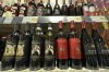 Italian bottles of wines are shown on display at a liquor store in Niles, Ill., Thursday, March 13, 2025. (AP Photo/Nam Y. Huh)