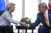 President Donald Trump and European Commission President Ursula von der Leyen shake hands after reaching a trade deal at the Trump Turnberry golf course in Turnberry, Scotland Sunday, July 27, 2025. (AP Photo/Jacquelyn Martin)