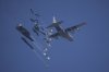 Humanitarian aid is airdropped to Palestinians over Gaza City, Gaza Strip, Sunday, July 27, 2025. (AP Photo/Jehad Alshrafi)