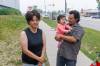 MIKE DEAL / FREE PRESS
                                Evacuees from Garden Hill Anisininew Nation, Misty Harper, Ryan Little, and daughter, Diane, 1, outside the Winnipeg Soccer Federation North building at 770 Leila Ave. Friday morning.