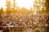 MIKAELA MACKENZIE / FREE PRESS files
                                Smoke hangs visibly in the air as the crowd listens to Allison Russell on the mainstage at the Winnipeg Folk Festival Thursday night.