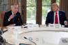 AP Photo/Mark Schiefelbein
                                U.S. President Donald Trump, right, and Canada&rsquo;s Prime Minister Mark Carney participate in a session of the G7 Summit, June 16.