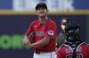 Cleveland Guardians starting pitcher Tanner Bibee, left, reacts as catcher Bo Naylor, right, walks out to the mound in the first inning of a baseball game against the Baltimore Orioles in Cleveland, Monday, July 21, 2025. (AP Photo/Sue Ogrocki)