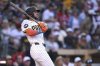 San Diego Padres' Jackson Merrill watches his home run during the sixth inning of a baseball game against the Philadelphia Phillies, Saturday, July 12, 2025, in San Diego. (AP Photo/Orlando Ramirez)