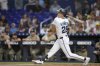 Miami Marlins' Kyle Stowers hits a double in to bring in a run by Agustín Ramírez, in the first inning of a baseball game against the San Diego Padres, Tuesday, July 22, 2025, in Miami. (AP Photo/Rebecca Blackwell)