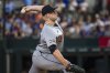 Detroit Tigers' Tarik Skubal pitches during the first inning of a baseball game against the Texas Rangers, Sunday, July 20, 2025, in Arlington, Texas. (AP Photo/Jessica Tobias)