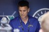 Seattle Mariners general manager Jerry Dipoto talks to reporters in the dugout before a baseball game between the Seattle Mariners and the Texas Rangers, Thursday, July 31, 2025, in Seattle. (AP Photo/John Froschauer)