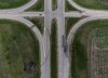 A scorched patch of ground where a bus carrying seniors ended up after colliding with a transport truck and burning on Thursday is seen on the edge of the Trans-Canada Highway where it intersects with Hwy 5, west of Winnipeg near Carberry, Man., Friday, June 16, 2023. THE CANADIAN PRESS/Darryl Dyck