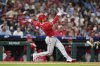 Los Angeles Angels' Taylor Ward follows through after hitting a two-run home run against Philadelphia Phillies pitcher Tanner Banks during the seventh inning of a baseball game Friday, July 18, 2025, in Philadelphia. (AP Photo/Matt Slocum)