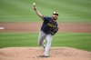 Milwaukee Brewers starting pitcher Brandon Woodruff throws during the second inning of a baseball game against the Washington Nationals, Saturday, Aug. 2, 2025, in Washington. (AP Photo/Nick Wass)