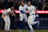 Blue Jays outfielder Addison Barger (47) is congratulated on a home run by his teammates during Major League Baseball action against the Arizona Diamondbacks in Toronto on Tuesday, June 17, 2025. THE CANADIAN PRESS/Arlyn McAdorey