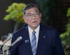 Japanese Prime Minister Shigeru Ishiba speaks to the media after President Donald Trump announced a trade framework with Japan, at the prime minister's office in Tokyo, Japan, Wednesday, July 23, 2025. (Kyodo News via AP)