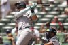 New York Yankees' Aaron Judge (99) hits a solo home run against the Atlanta Braves in the first inning of a baseball game, Sunday, July 20, 2025, in Atlanta. (AP Photo/Mike Stewart)