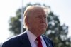 President Donald Trump speaks with reporters before departing on Marine One from the South Lawn of the White House on Friday, July 25, 2025, in Washington. (AP Photo/Alex Brandon)