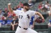 Chicago White Sox starting pitcher Adrian Houser throws against the Toronto Blue Jays during the first inning of a baseball game in Chicago, Wednesday, July 9, 2025. (AP Photo/Nam Y. Huh)