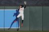 Minnesota Twins center fielder Byron Buxton (25) catches a fly out hit by Washington Nationals' Luis García Jr. (2) during the first inning of a baseball game Saturday, July 26, 2025, in Minneapolis. (AP Photo/Abbie Parr)
