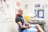 Jason Stutz, a staff member at Toronto's Kensington Market Overdose Prevention Site (KMOPS), is photographed in the consumption room on Thursday, July 31, 2025. THE CANADIAN PRESS/Chris Young