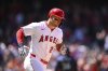 Los Angeles Angels' Mike Trout runs after hitting a home run during the fifth inning of a baseball game against the Seattle Mariners, Sunday, July 27, 2025, in Anaheim, Calif. (AP Photo/William Liang)