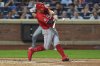 Cincinnati Reds' Austin Hays hits a home run during the sixth inning of a baseball game against the New York Mets Friday, July 18, 2025, in New York. (AP Photo/Frank Franklin II)