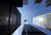 A Canadian flag flies in the Bay Street financial district in Toronto on Friday, Aug. 5, 2022. THE CANADIAN PRESS/Nathan Denette