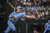 Texas Rangers' Chris Martin pitches during the eighth inning of a baseball game against the Detroit Tigers, Sunday, July 20, 2025, in Arlington, Texas. (AP Photo/Jessica Tobias)
