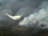 A water bomber aircraft battles a wildfire in southeast Manitoba as shown in this handout photo provided by the Manitoba government. THE CANADIAN PRESS/HO-Manitoba government*MANDATORY CREDIT*