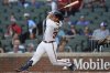 Atlanta Braves' Drake Baldwin (30) hits a solo home run against the Miami Marlins in the first inning of a baseball game, Thursday, Aug. 7, 2025, in Atlanta. (AP Photo/Mike Stewart)