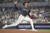 Miami Marlins' pitcher Eury Pérez pitches against the New York Yankees during the first inning of a baseball game, Saturday, Aug. 2, 2025, in Miami. (AP Photo/Jim Rassol)