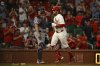 Washington Nationals catcher Riley Adams looks on as St. Louis Cardinals' Brendan Donovan runs the bases after hitting a home run during the third inning of a baseball game, Tuesday, July 8, 2025, in St. Louis. (AP Photo/Jeff Le)