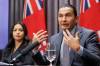 MIKE DEAL / FREE PRESS FILES
                                Premier Wab Kinew, right, announced Wednesday the completed search of Prairie Green Landfill for two victims of a convicted serial killer cost $18 million.