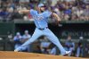 Texas Rangers starting pitcher Merrill Kelly throws to the Cleveland Guardians in the third inning of a baseball game Sunday, Aug. 24, 2025, in Arlington, Texas. (AP Photo/Tony Gutierrez)