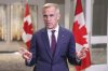 Prime Minister Mark Carney speaks to the media, at the Liberal cabinet retreat, in Toronto, Wednesday, Sept. 3, 2025. THE CANADIAN PRESS/Chris Young