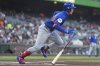 Chicago Cubs' Pete Crow-Armstrong runs to first base after hitting a single against the San Francisco Giants during the first inning of a baseball game in San Francisco, Tuesday, Aug. 26, 2025. (AP Photo/Jeff Chiu)