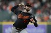 Baltimore Orioles starting pitcher Brandon Young throws during the first inning of a baseball game against the Houston Astros in Houston, Friday, Aug. 15, 2025. (AP Photo/Ashley Landis)