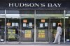 A person checks out the store closing advertising at the Hudson's Bay in Toronto, on Friday, May 30, 2025. THE CANADIAN PRESS/Nathan Denette
