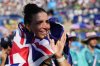 FILE - Jessica Fox celebrates her sister Noemie Fox of Australia after she won a gold medal in the women's kayak cross finals during the canoe slalom at the 2024 Summer Olympics, on Aug. 5, 2024, in Vaires-sur-Marne, France. (AP Photo/Ebrahim Noroozi, File)