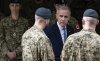 Prime Minister Mark Carney meets with members of the Canadian Armed Forces stationed in Warsaw, Poland on Monday, August 25, 2025. THE CANADIAN PRESS/Christinne Muschi