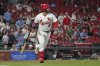St. Louis Cardinals' Alec Burleson watches his walk-off home run during the ninth inning of a baseball game against the Pittsburgh Pirates Monday, Aug. 25, 2025, in St. Louis. (AP Photo/Jeff Roberson)