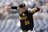 Pittsburgh Pirates pitcher Paul Skenes delivers during the first inning of a baseball game against the Colorado Rockies Sunday, Aug. 24, 2025, in Pittsburgh. (AP Photo/Matt Freed)