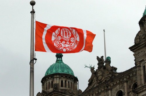 The Survivors’ Flag hangs to honour Indigenous Peoples who were forced to attend residential schools, on the grounds of the legislature in Victoria, B.C., on Wednesday, Sept. 28, 2022. THE CANADIAN PRESS/Chad Hipolito