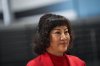 Billionaire Ruby Liu listens during an interview at a former Hudson's Bay-owned Saks Off 5th department store after a 