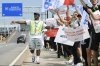 Air Canada flight attendants strike outside Montreal–Trudeau International Airport in Montreal, Saturday, Aug. 16, 2025. THE CANADIAN PRESS/Graham Hughes