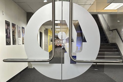FILE - An entrance to the Arizona PBS offices in the Walter Cronkite School of Journalism and Mass Communication in Phoenix is seen Friday, May 2, 2025. (AP Photo/Katie Oyan, File)